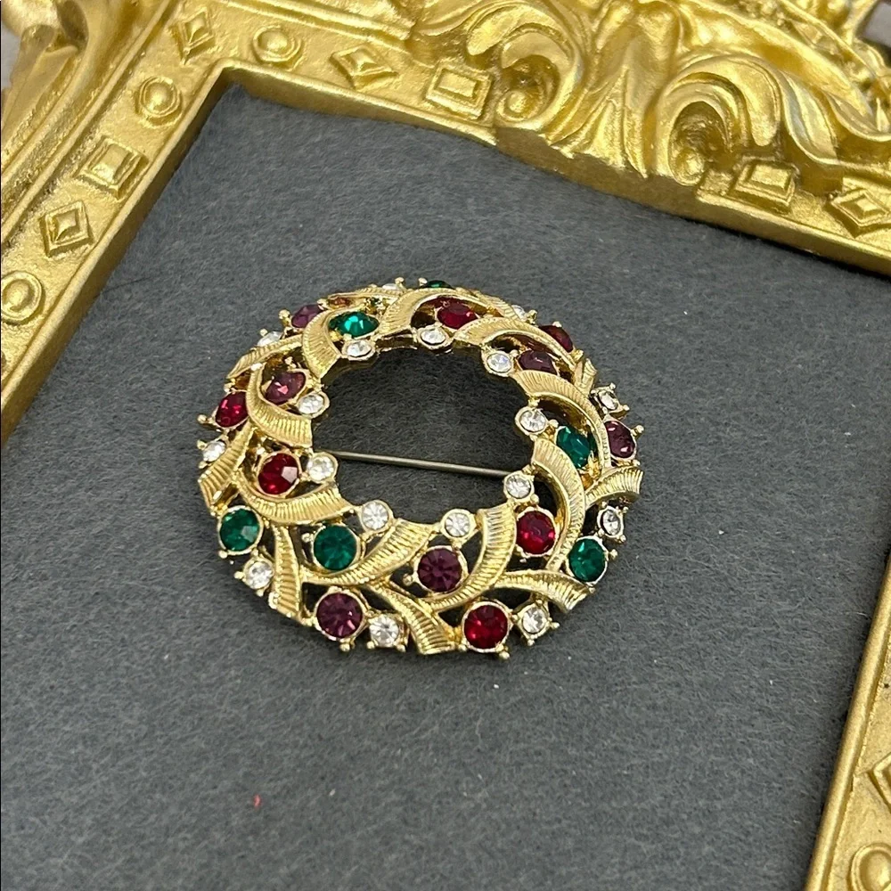 Elegant Gold and Jewel-Toned Brooch